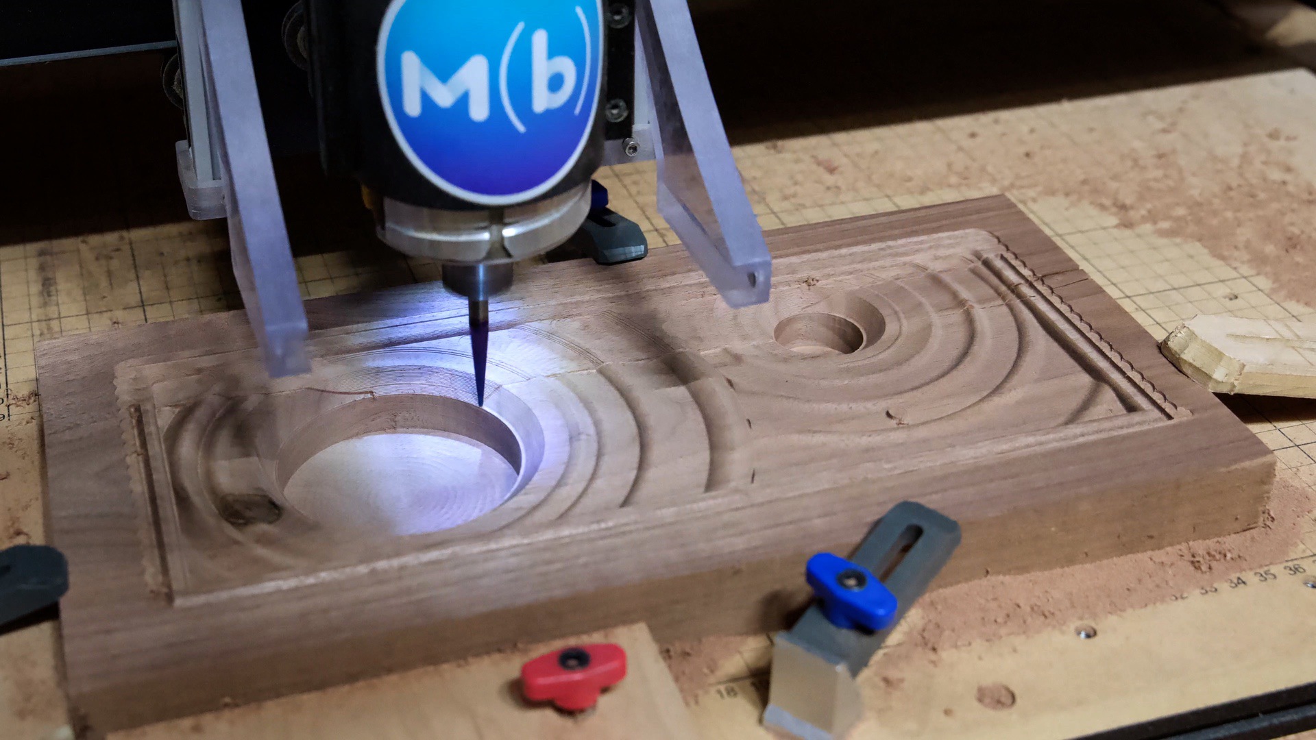 Carve the walnut Bluetooth speaker face out on the CNC