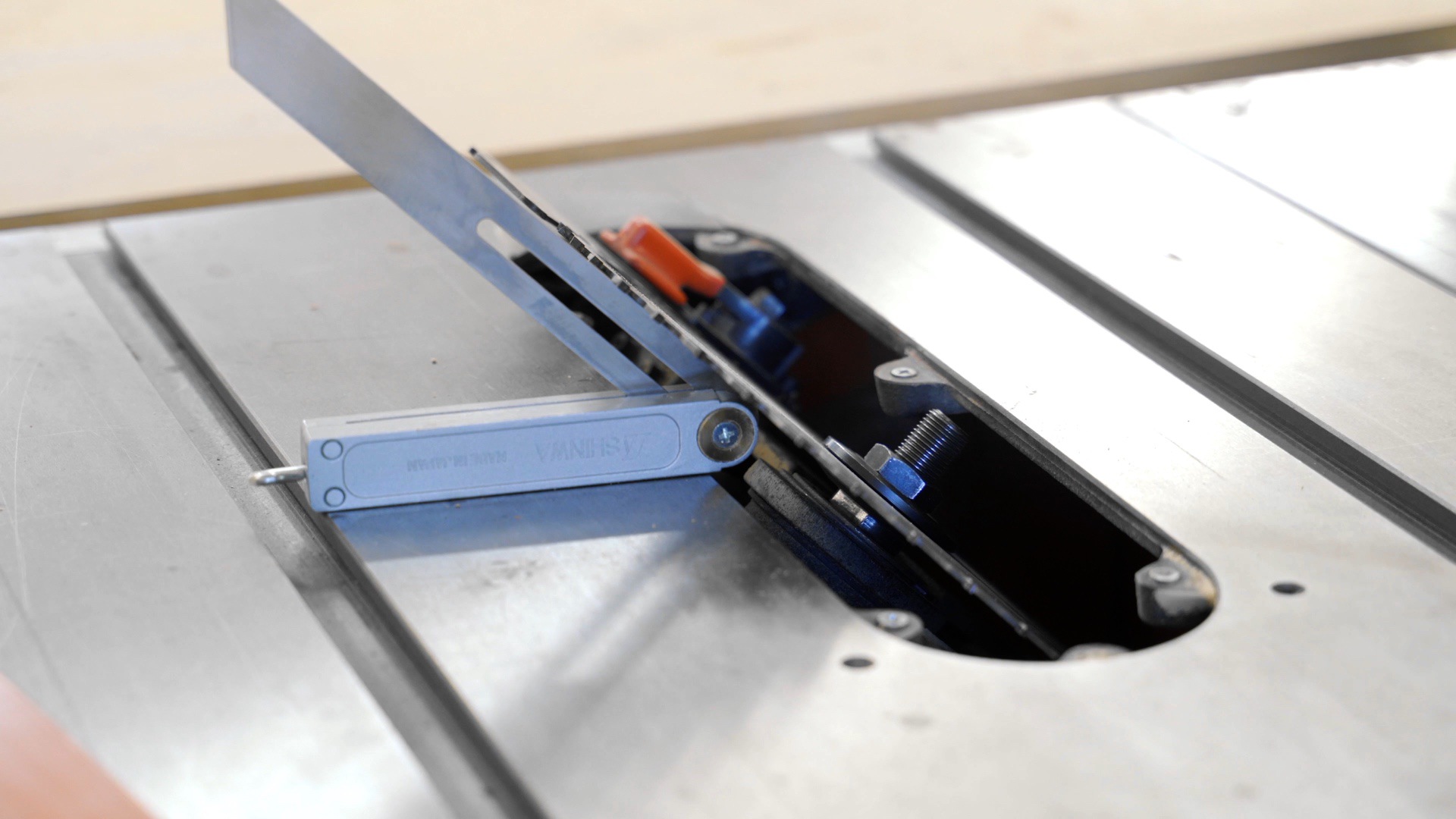 Check angle of table saw with an angle gauge