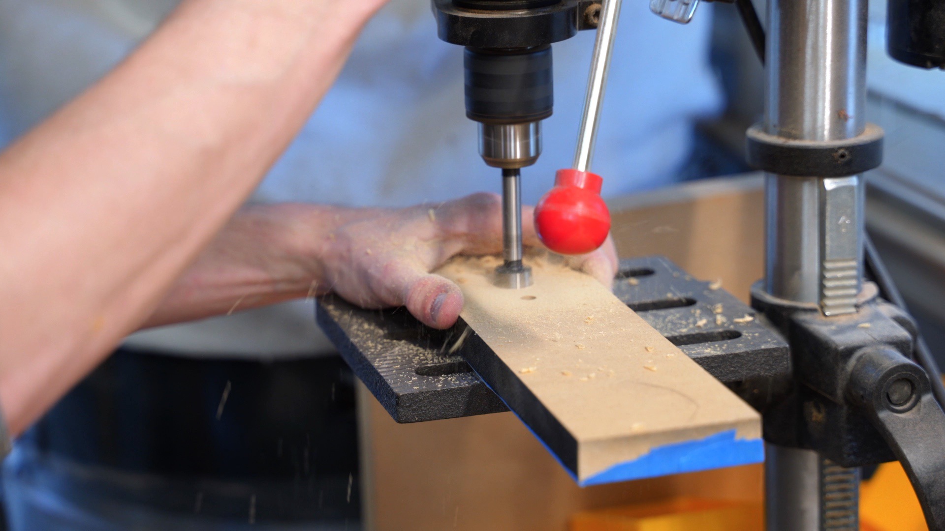 Drill out rear component holes on the drill press