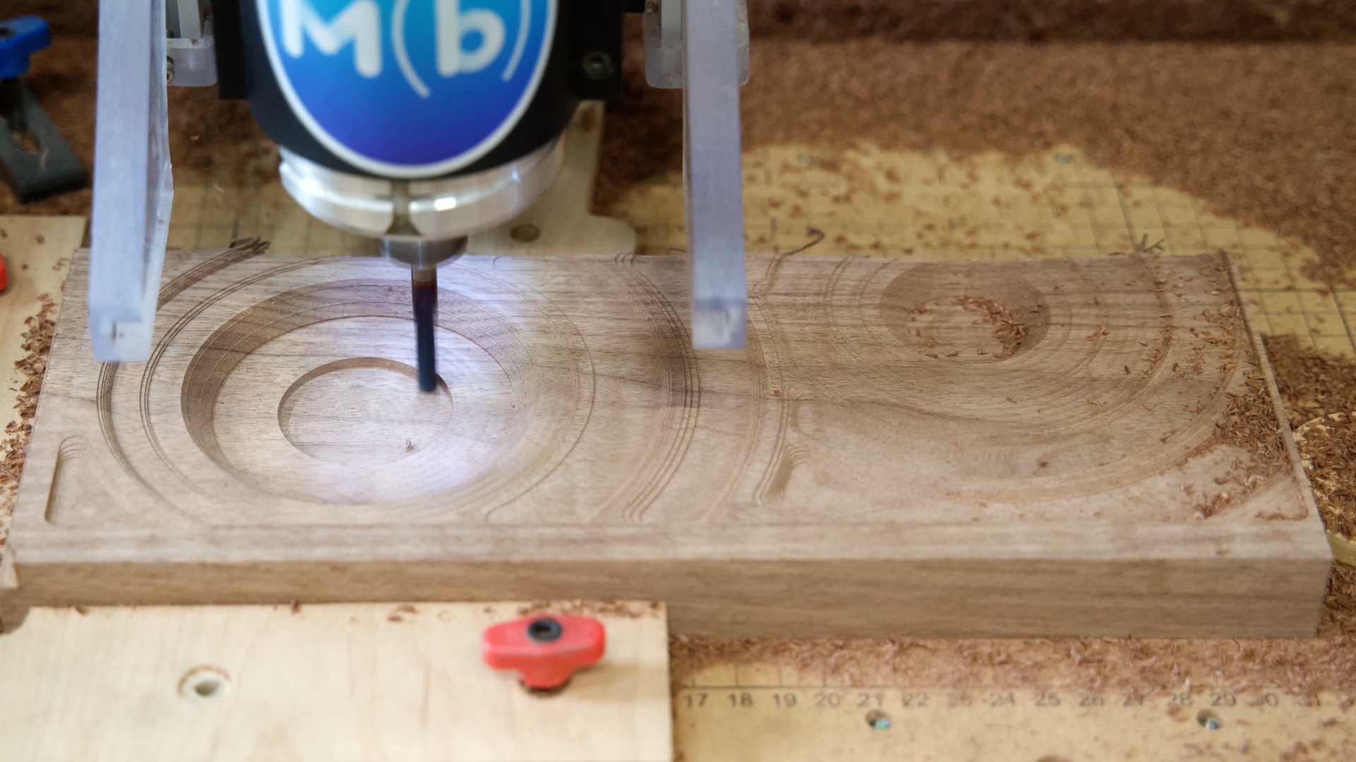 Carve the walnut Bluetooth speaker face out on the CNC